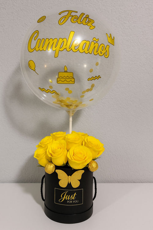 12 ROSAS AMARILLAS MAS 4 BOMBONES CON ENVASE NEGRO Y GLOBO