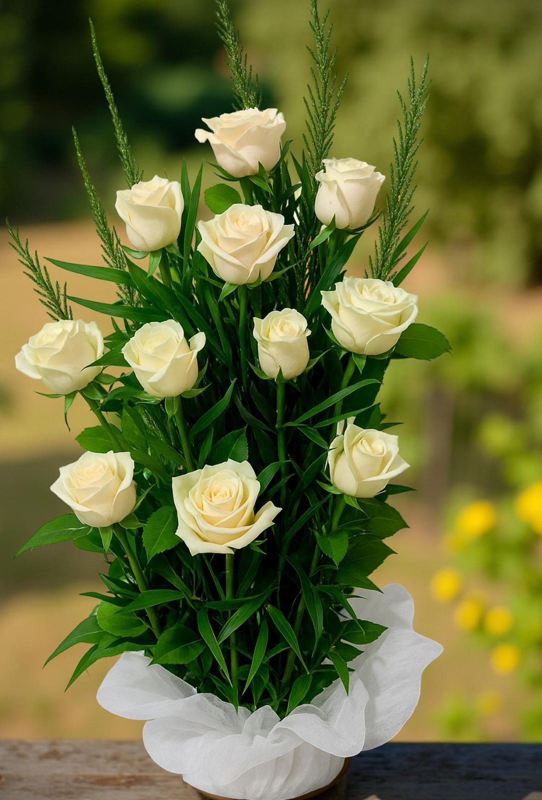 ARREGLO FUNEBRE 12 ROSAS BLANCAS