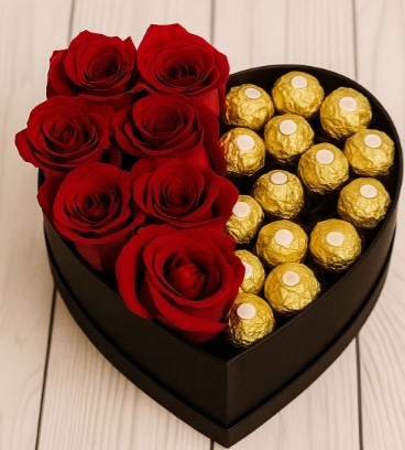 CORAZON NEGRO CON 7 ROSAS ROJAS Y 11 BOMBONES